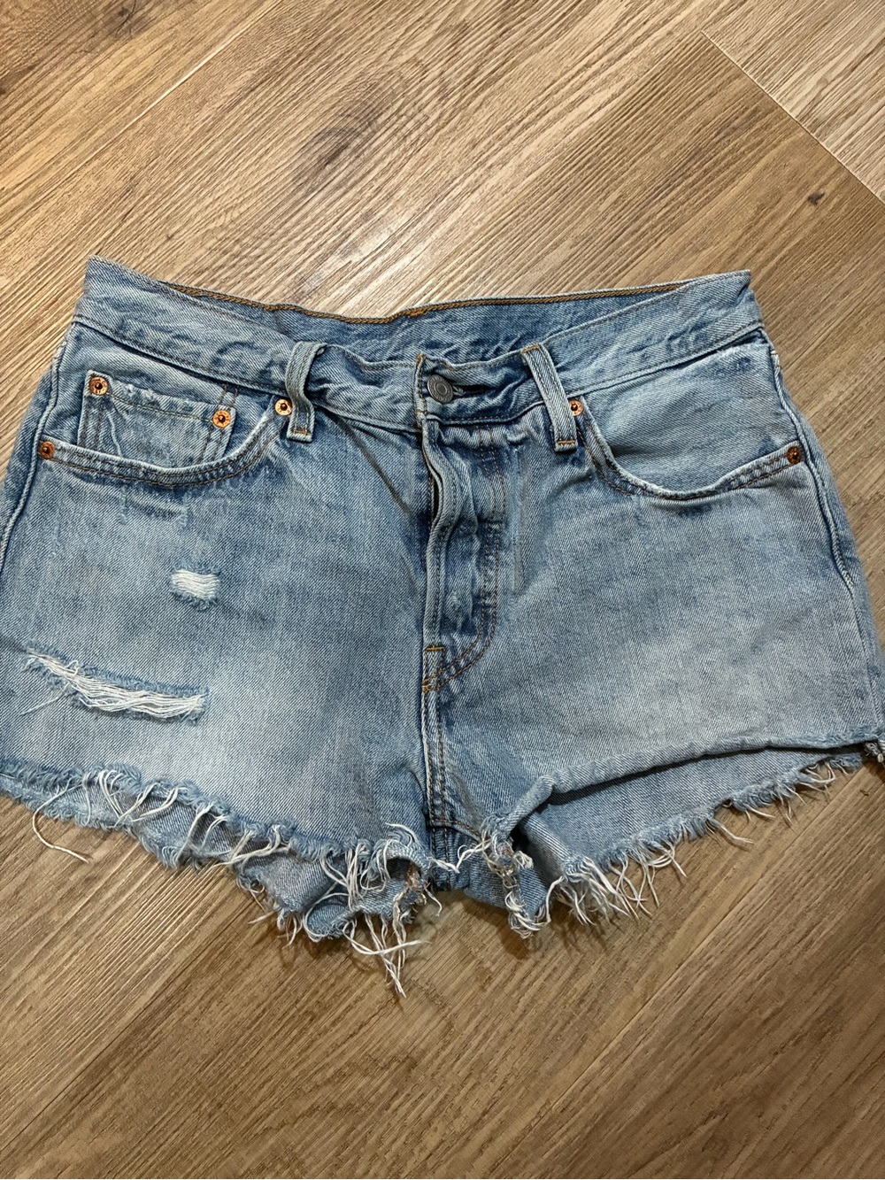 Levi's Light Blue Frayed Denim Cutoffs